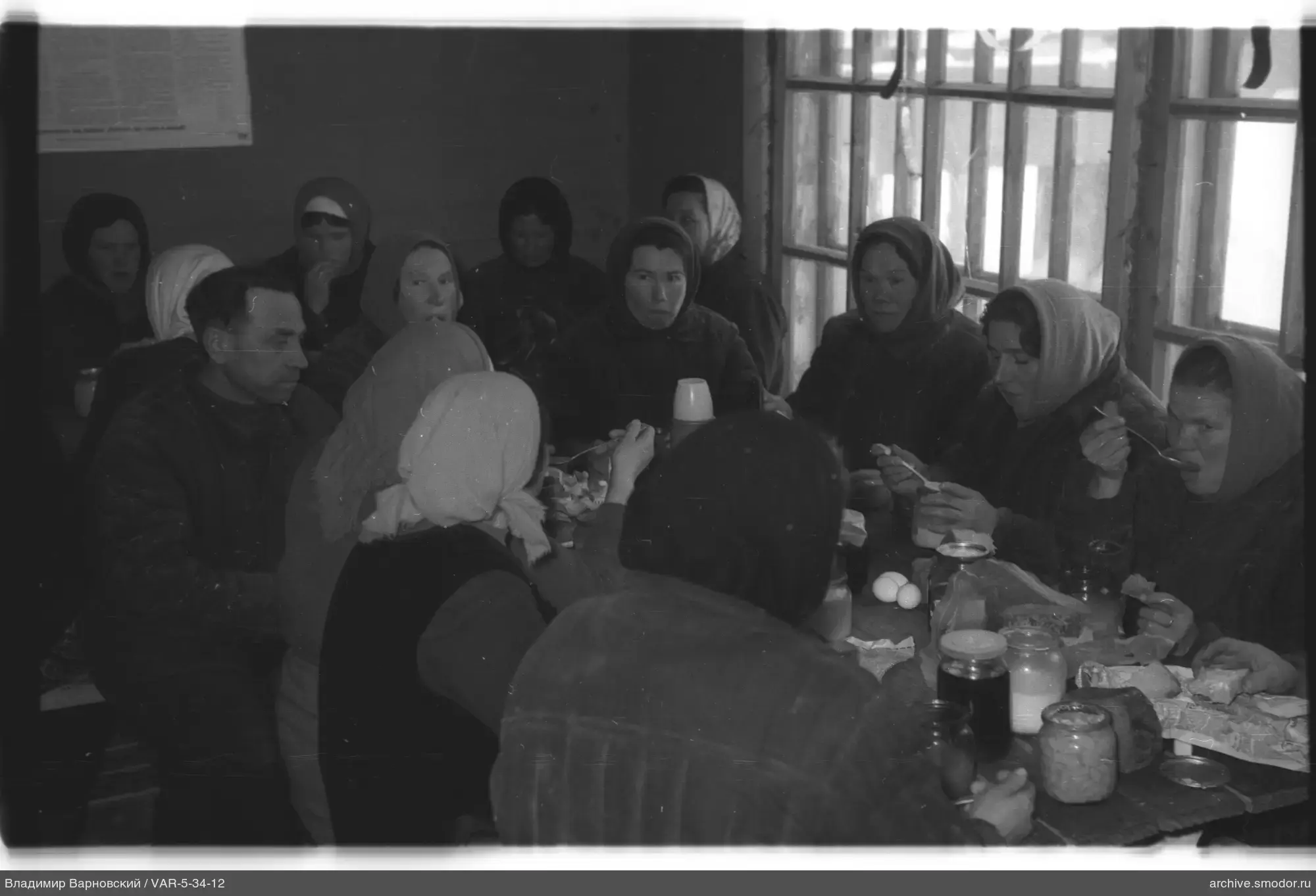 Group of people at a table in a room