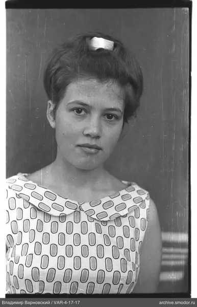 Portrait of a woman in a light dress