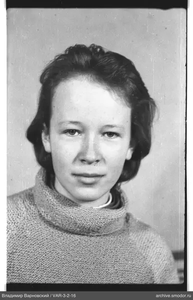Portrait of a woman in a light sweater
