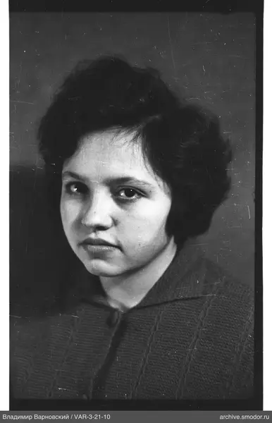 Portrait of a woman with short dark hair