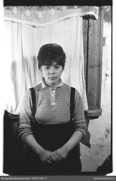 Portrait of a woman in a striped sweater