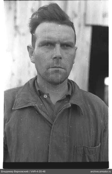 Portrait of a man in dark clothing