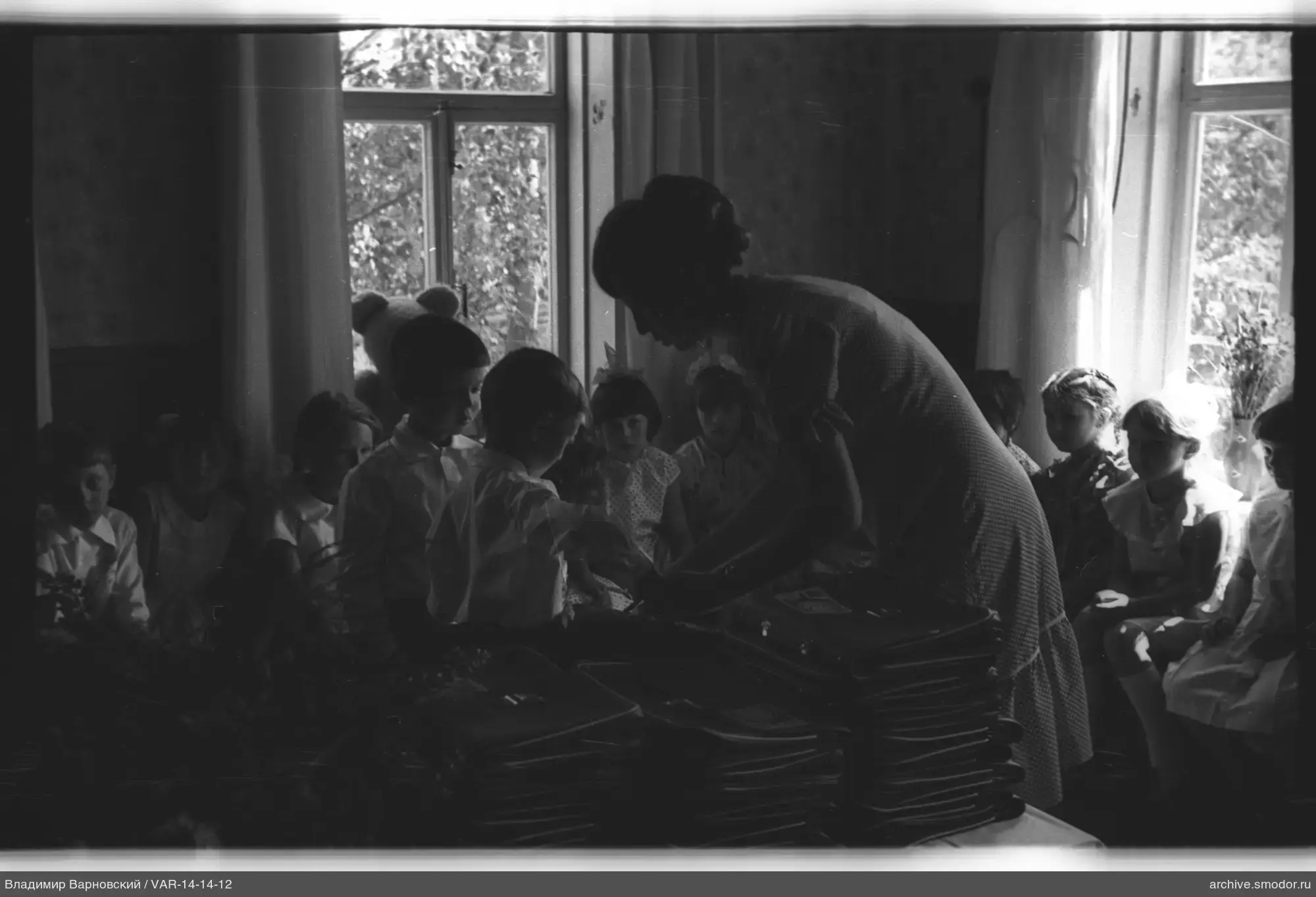 Woman and boy at table with briefcases