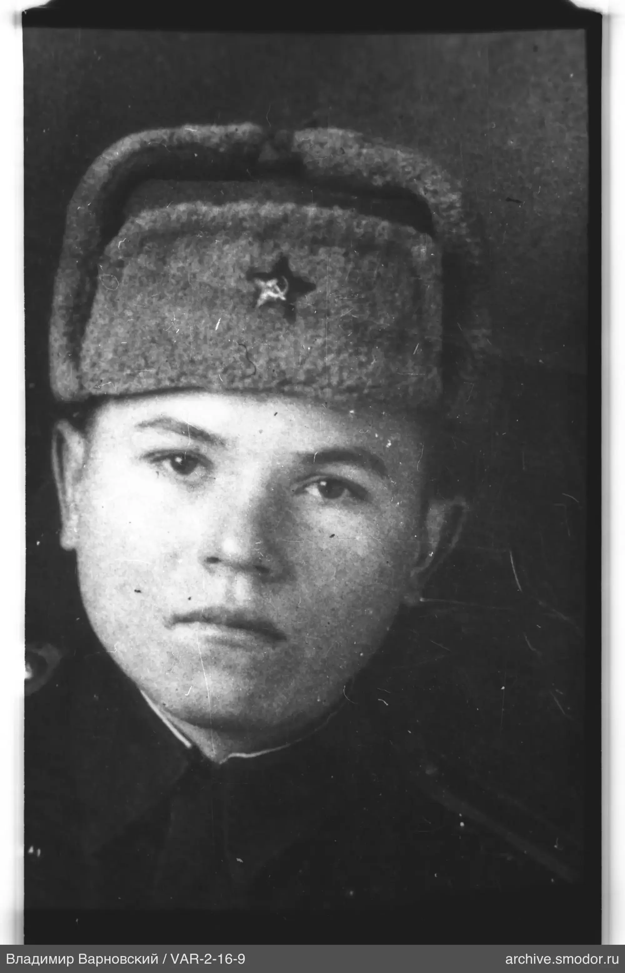 Портрет мужчины в военной форме и ушанке