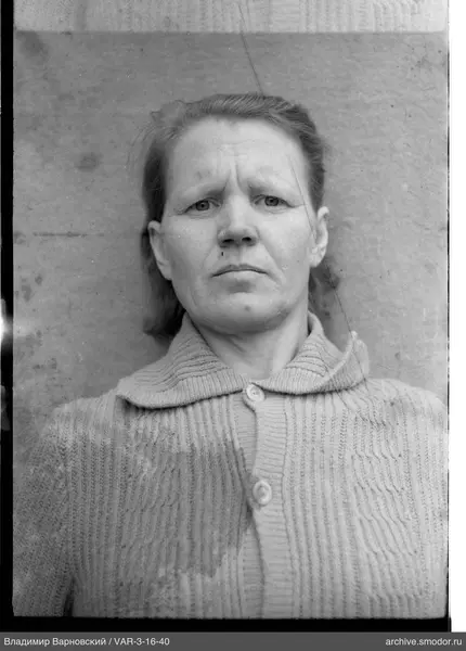 Portrait of a woman in a light cardigan