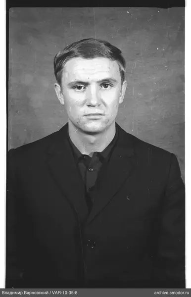 Portrait of a man in dark clothing
