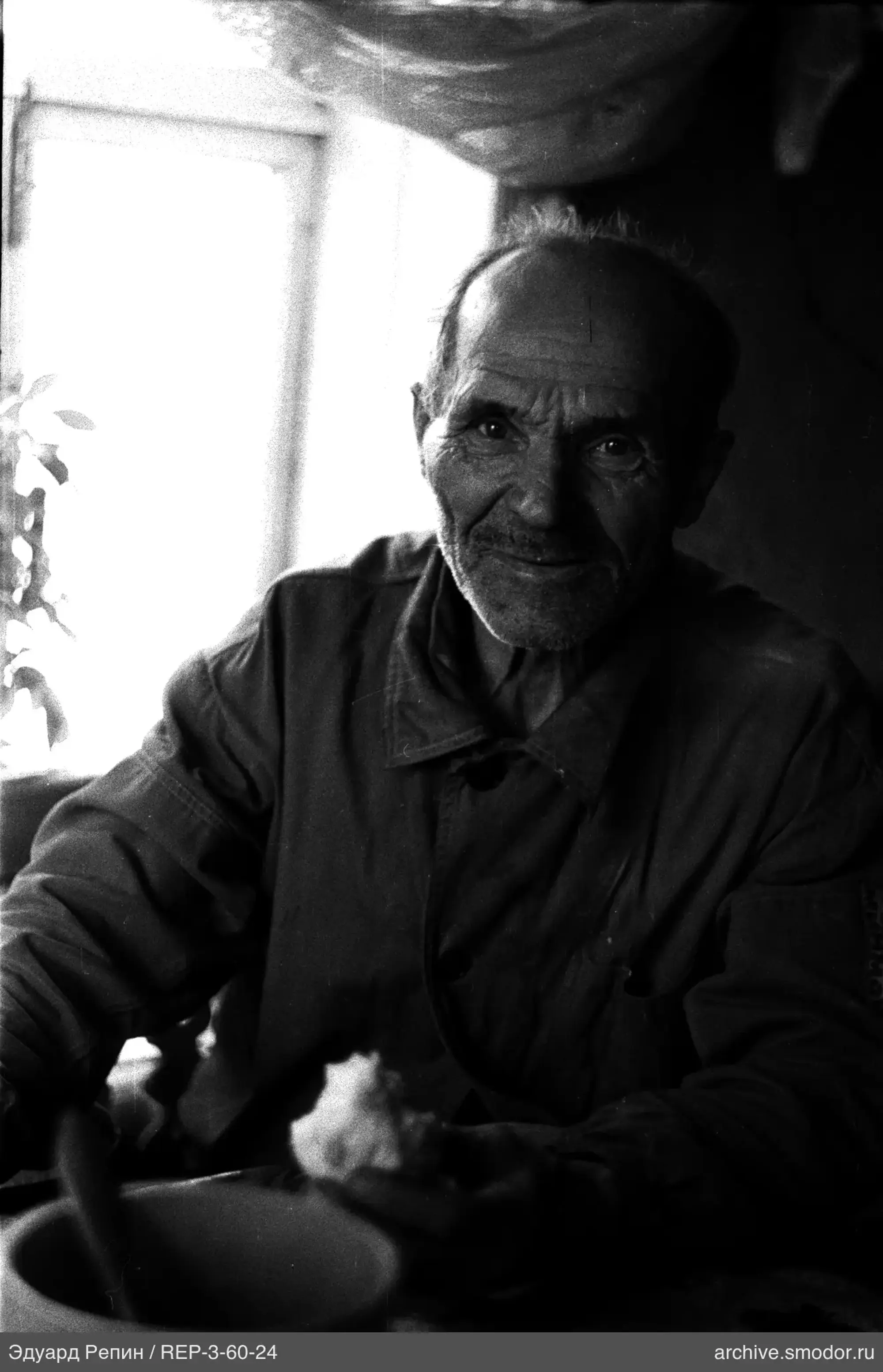 Man with food at the table