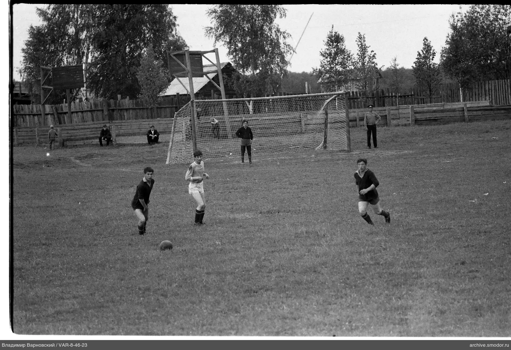 Children playing football on the field