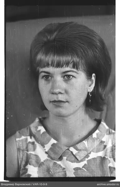Bust portrait of a woman with leaf-patterned dress
