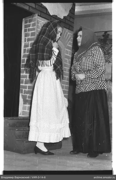 Two women facing each other