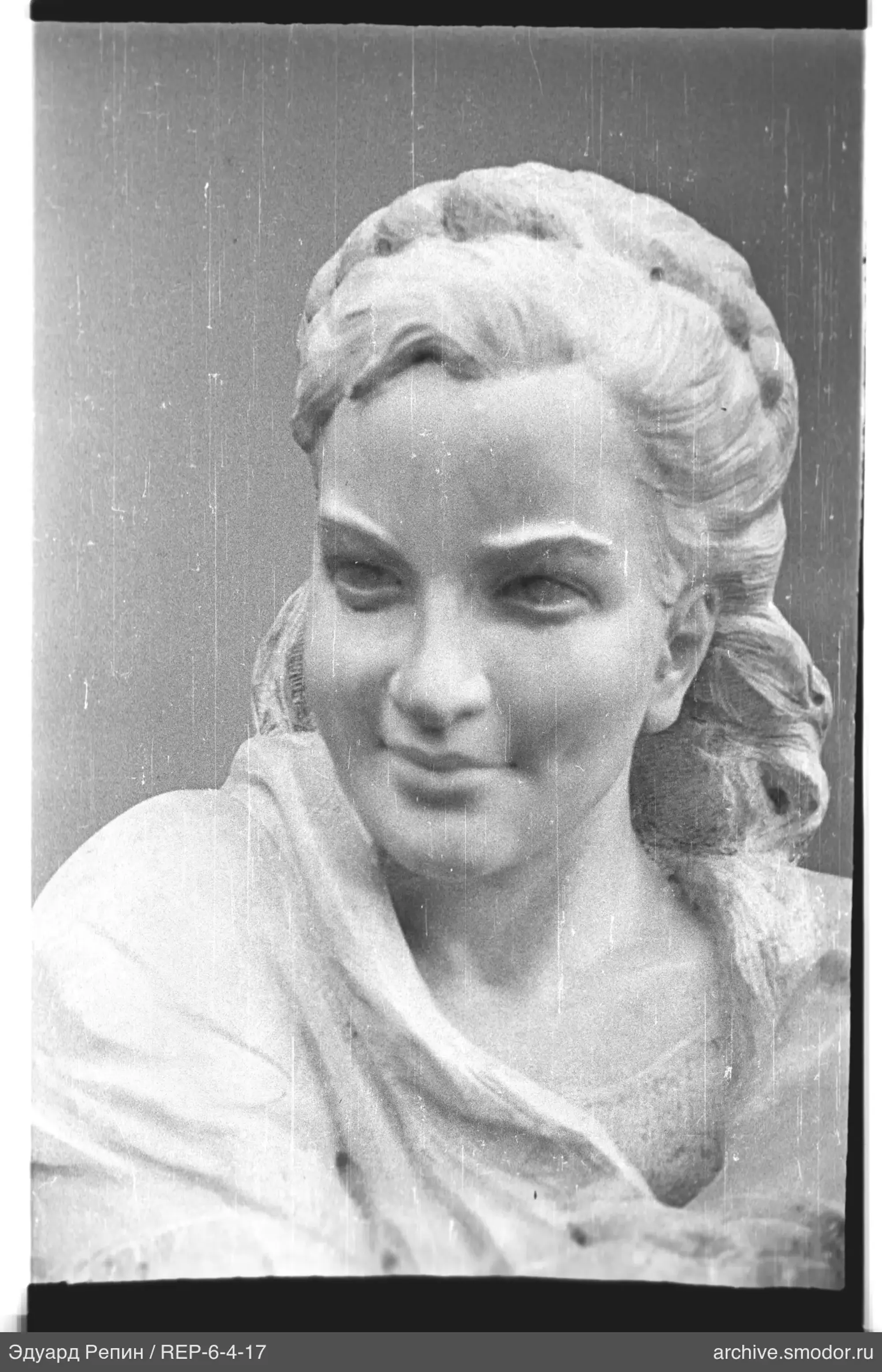 Portrait of a sculpture of a woman with headdress