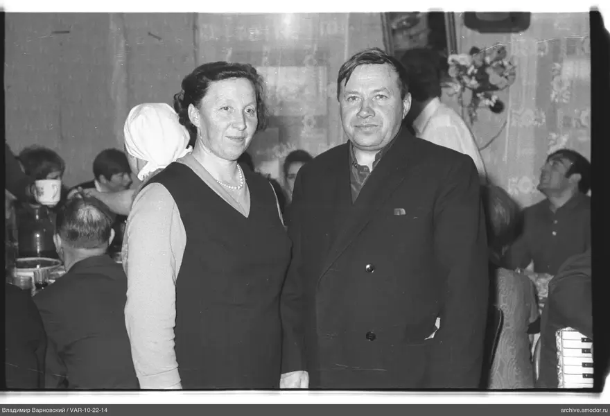 Group portrait with woman and man in center