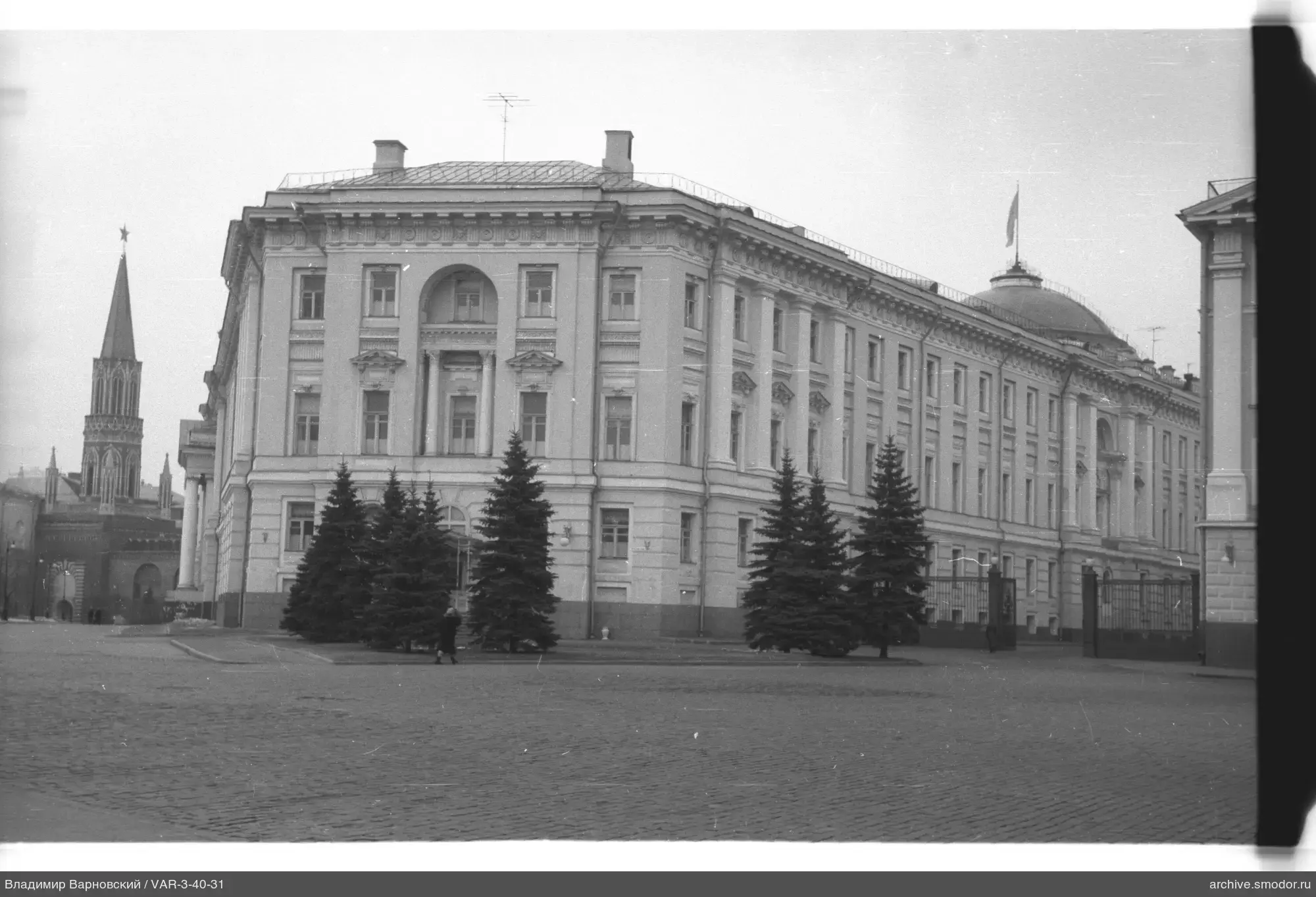 Multi-storey building with flag and tower