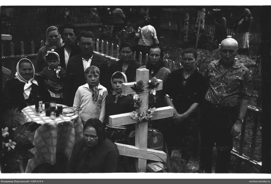 Group around a wooden cross