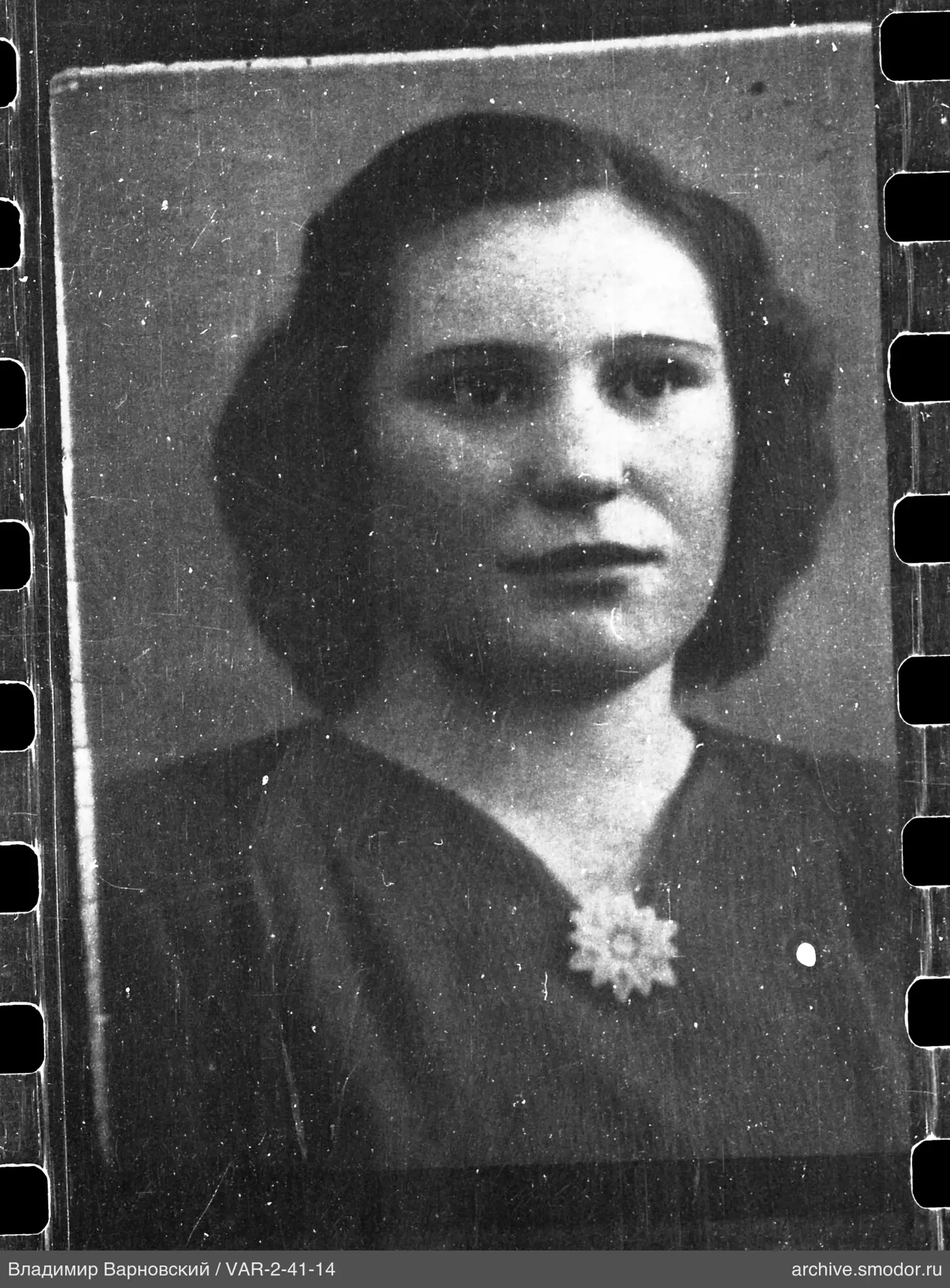 Portrait of a woman in a dark dress