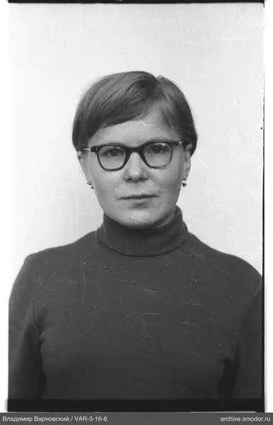 Portrait of a woman in a dark sweater