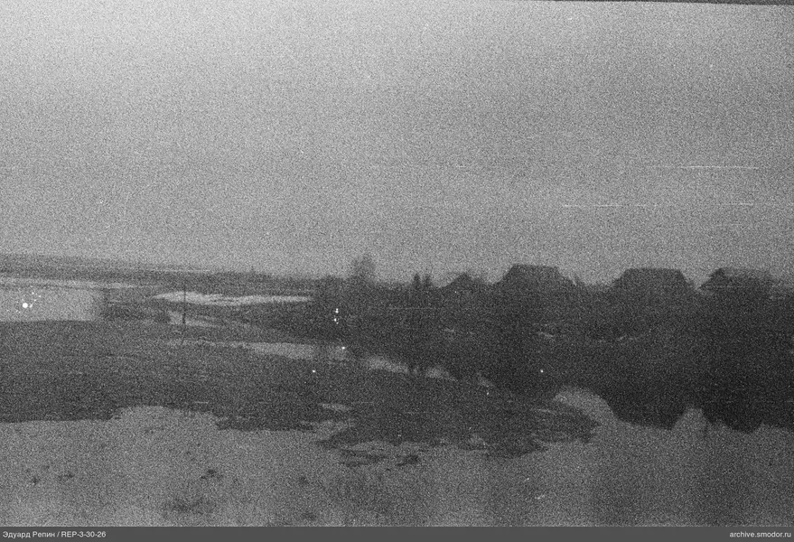 Landschaft mit Bäumen und Gebäuden