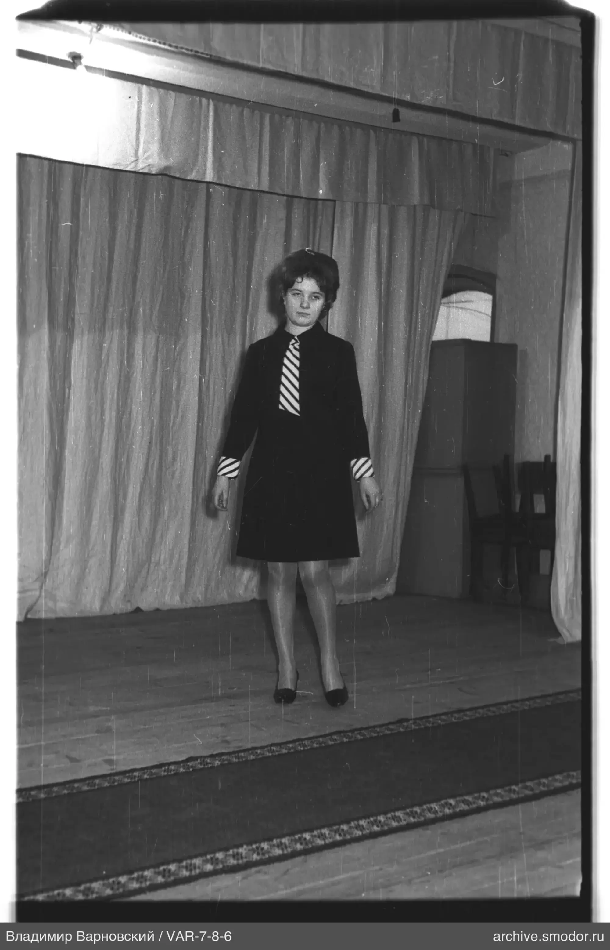 Full-length portrait of a woman