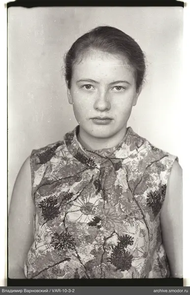 Portrait of a woman in a floral blouse