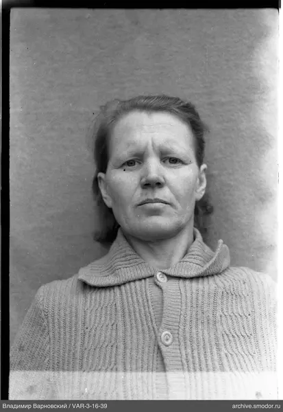 Portrait of a woman in a light cardigan