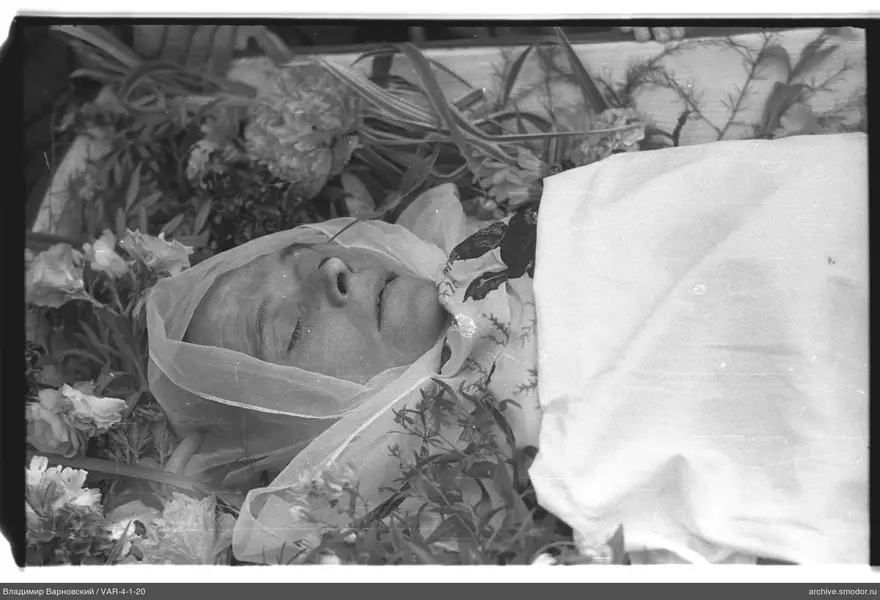Woman with flowers and fabric