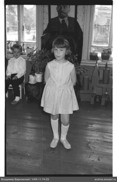 Girl and boy indoors