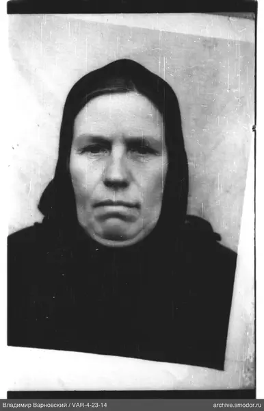 Portrait of a woman in dark clothing