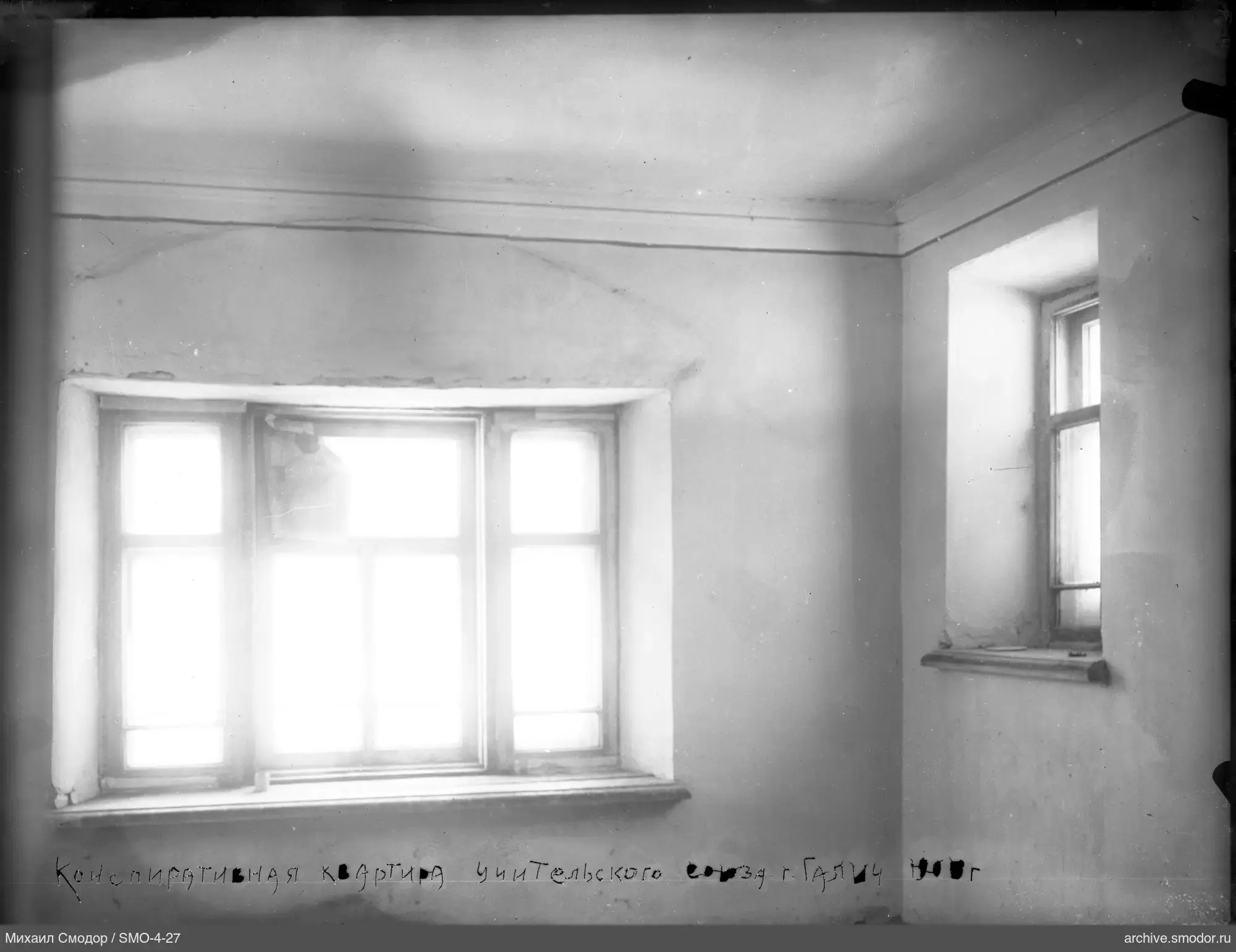 Interior of a room with two windows