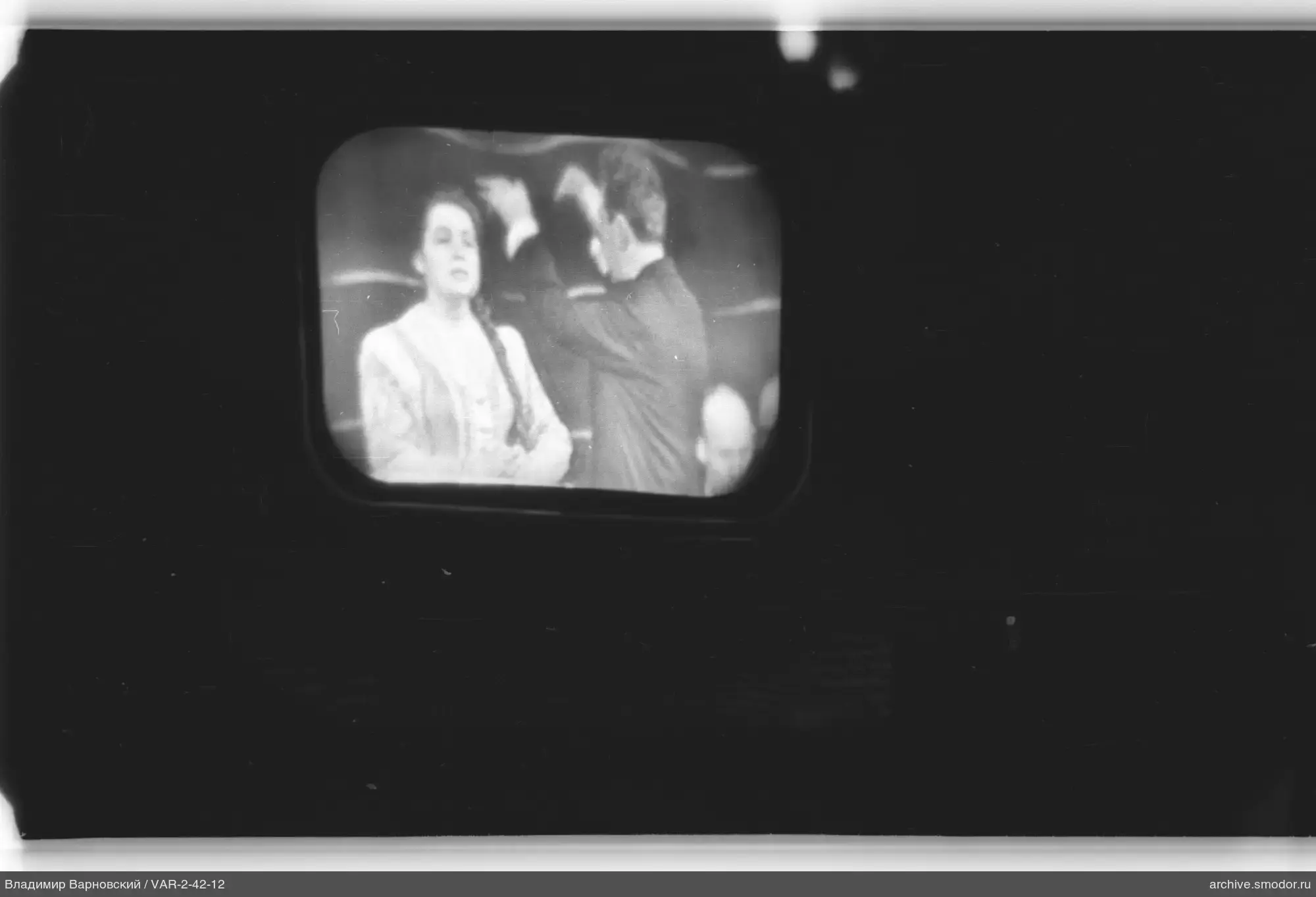 Television screen with woman and man