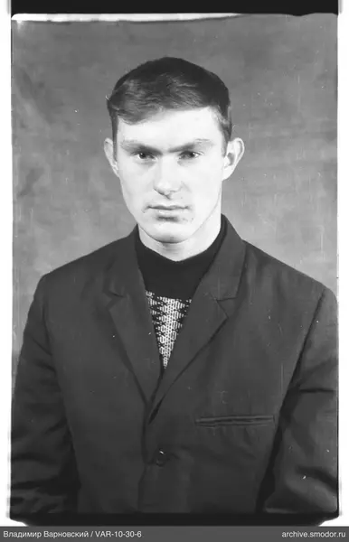 Portrait of a man in dark clothing
