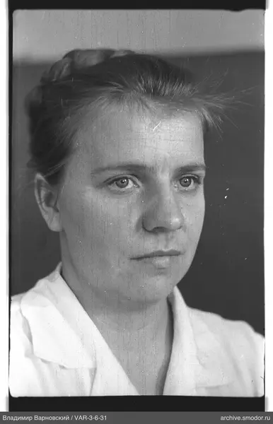Portrait of a woman with a bun