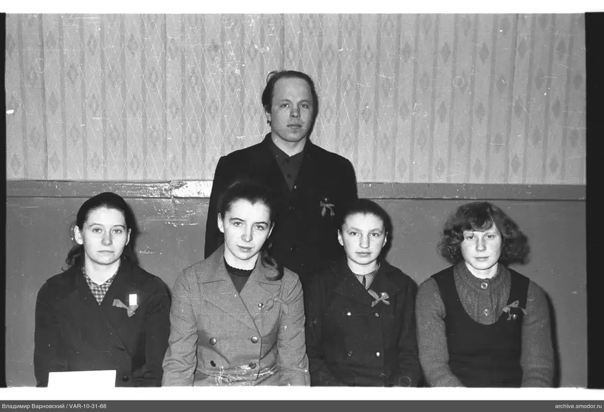 Group portrait of women and a man