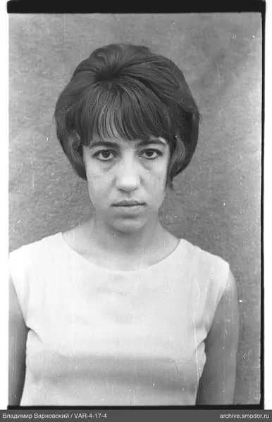 Portrait of a woman in a sleeveless top