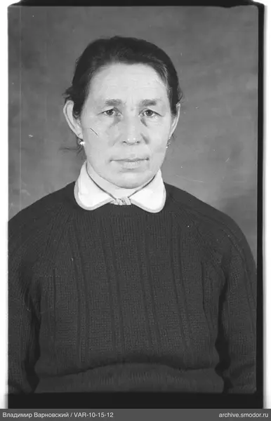 Portrait of a woman in a dark sweater
