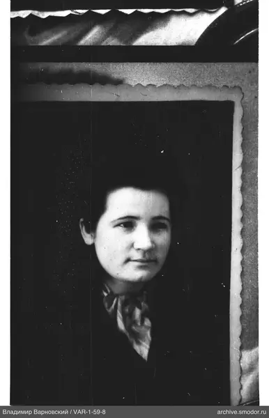 Portrait of a woman with a scarf