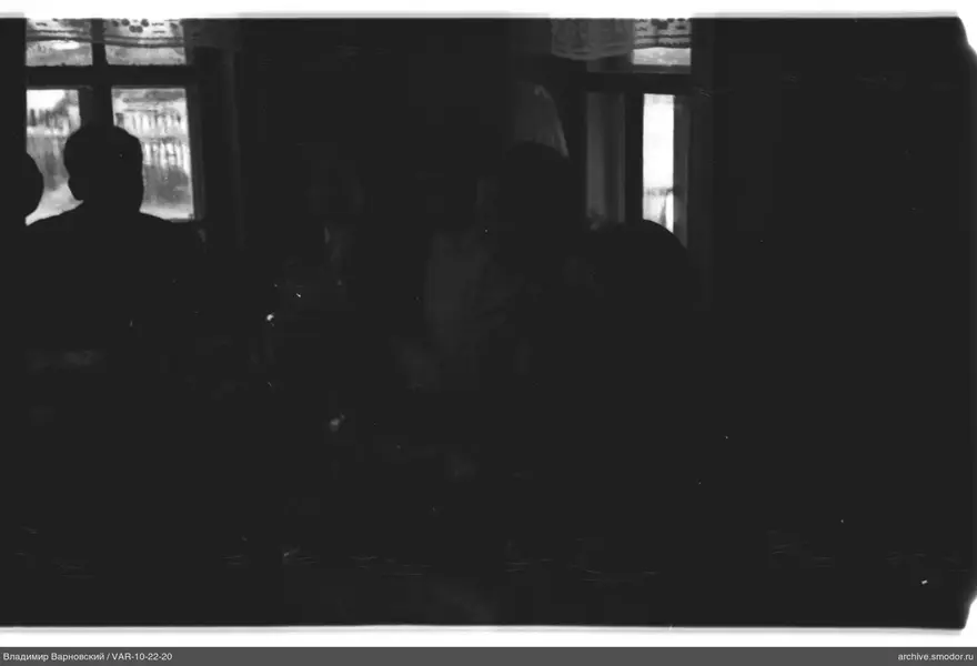 Group sitting at a table in a room