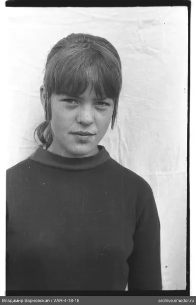 Portrait of a woman in a dark sweater