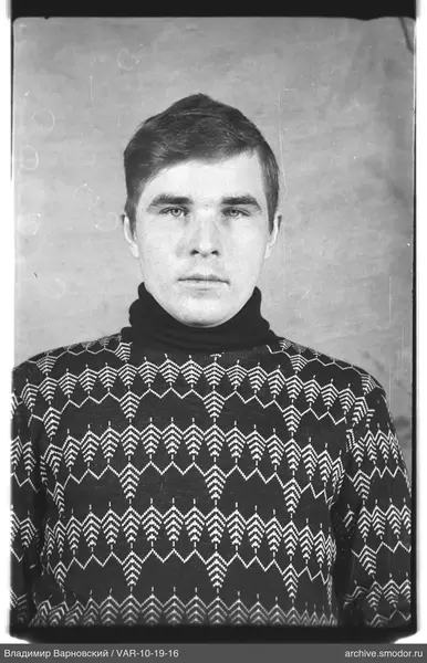 Portrait of a man in a dark sweater