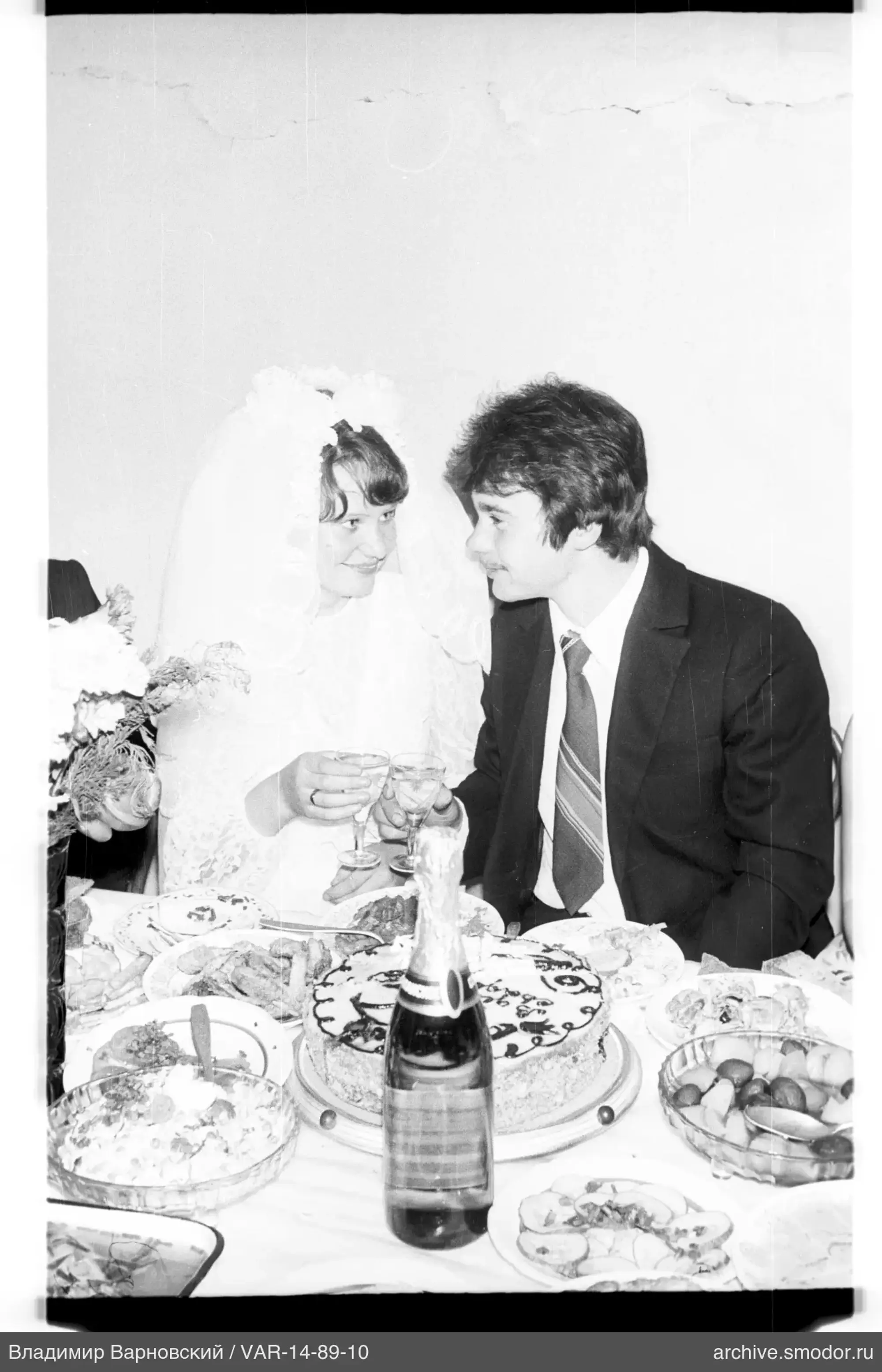 Bride and groom at the celebration table