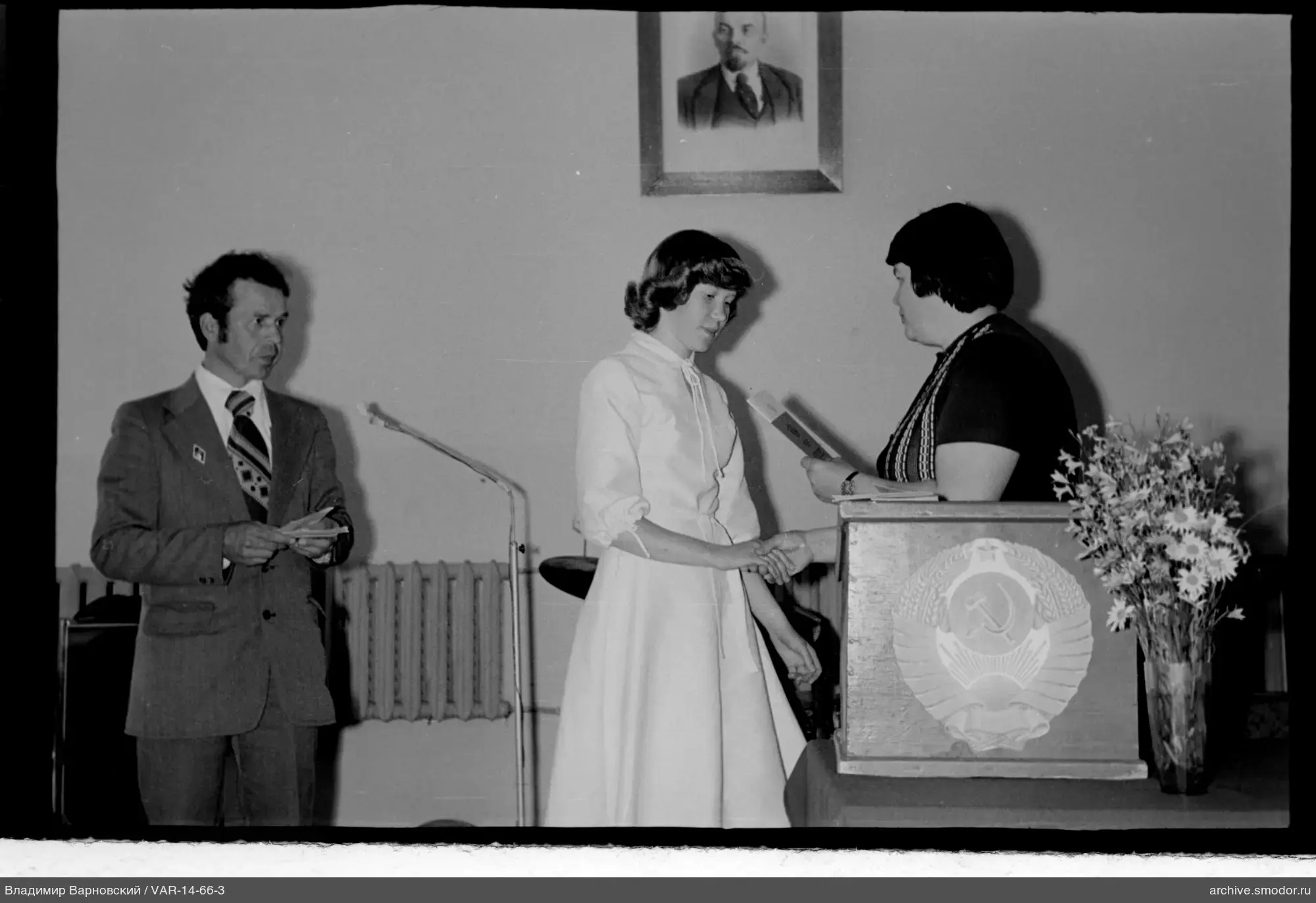 Women shaking hands at an event