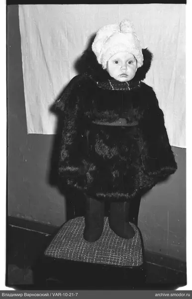 Child portrait in fur clothing
