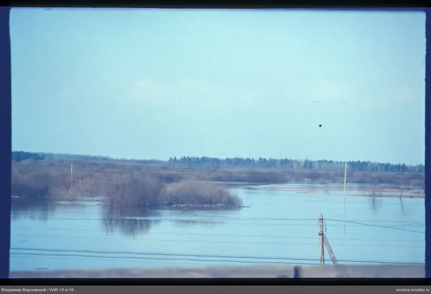 Water surface with power line supports