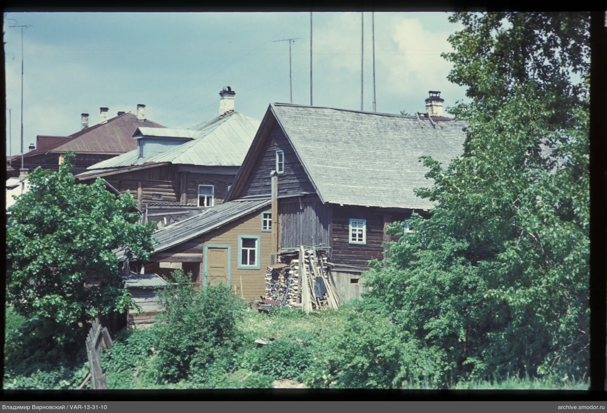 Wooden houses with different roofs