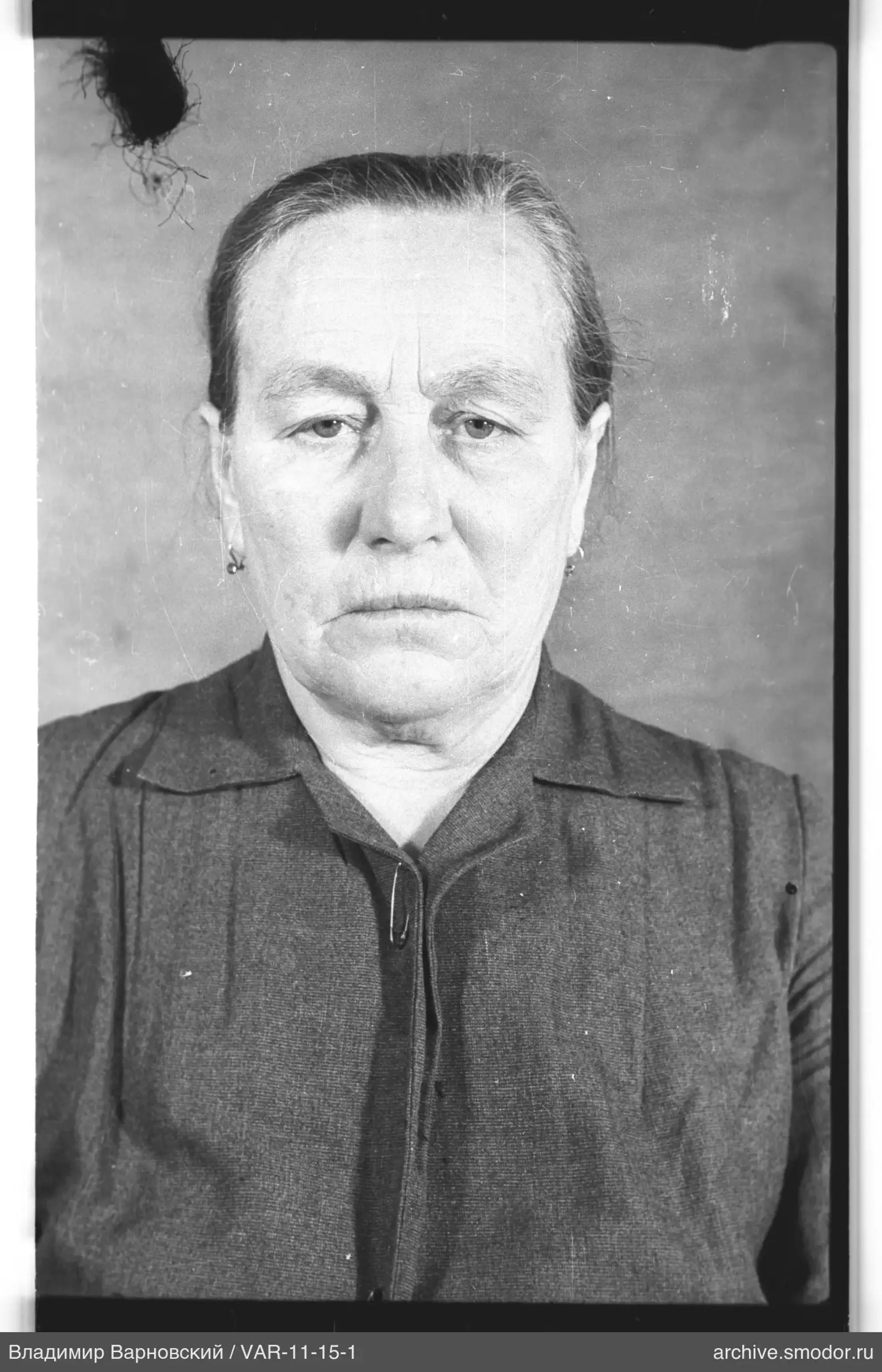Portrait of a woman in a dark dress