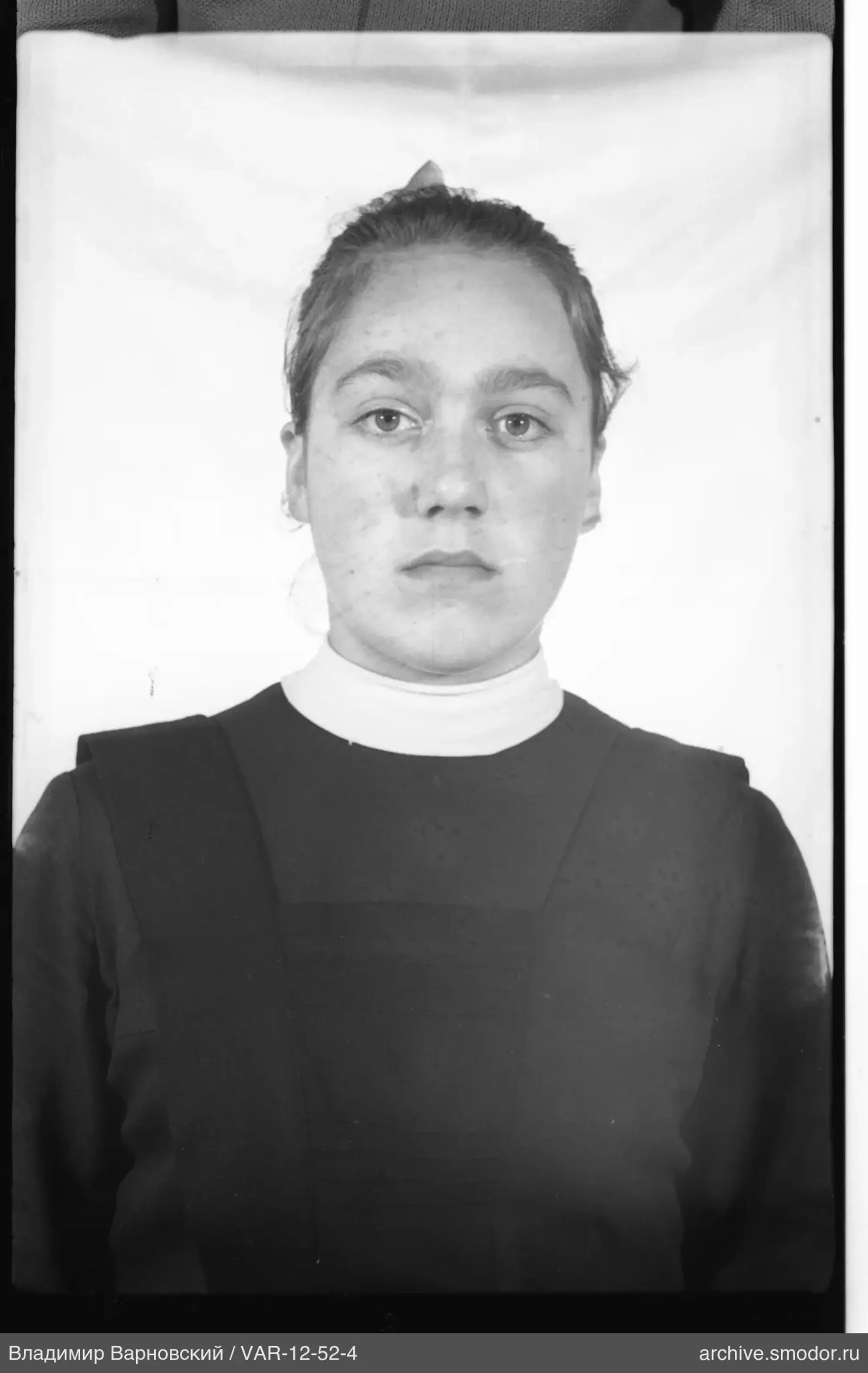 Portrait of a woman in a dark dress