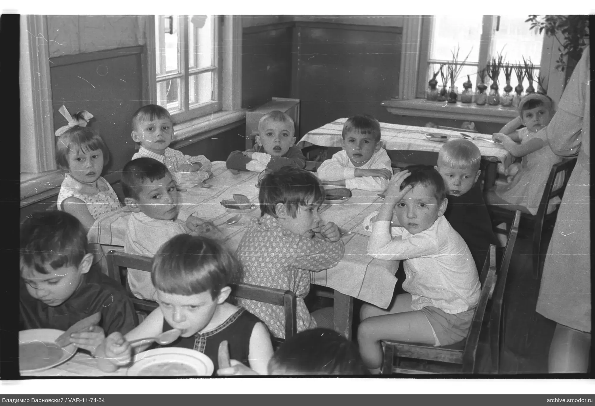 Children sitting at tables
