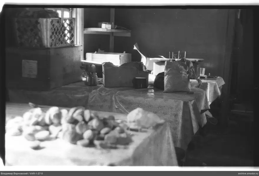 Interior with two tables and various objects