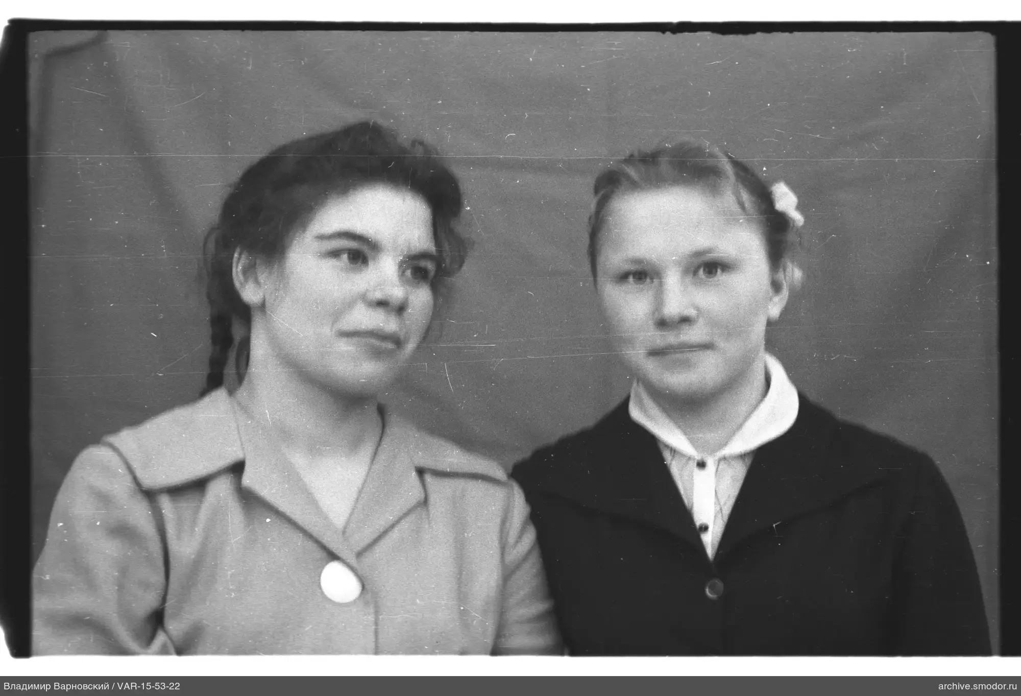 Two women in group portrait