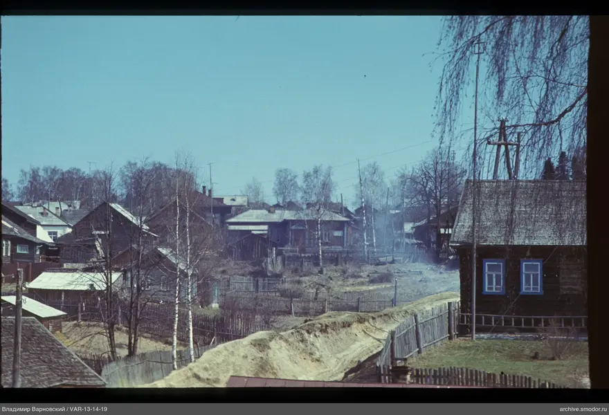 Village wooden houses and fences
