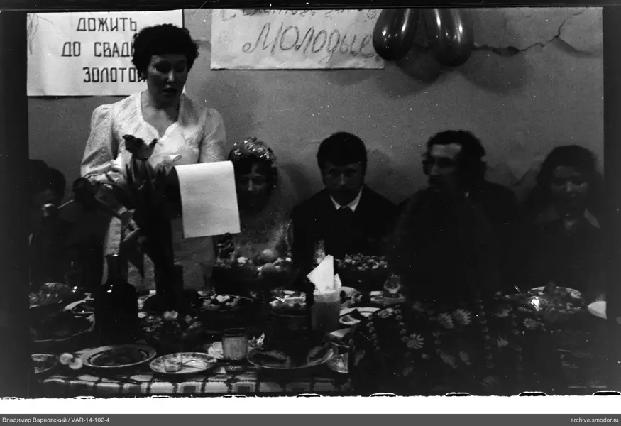 Woman with papers at wedding table